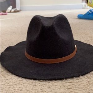 Black felt hat with brown buckle